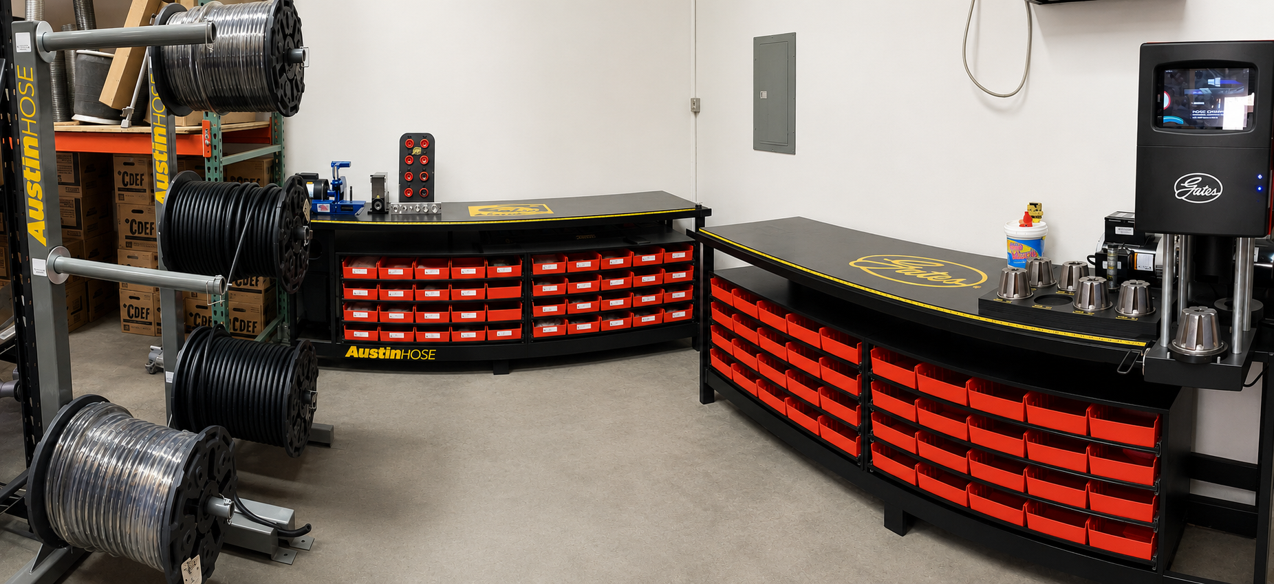 Hydraulic hose workstations and parts counters inside Premium Truck Parts in Gardena